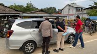 Personel Polsek Sekayam Gelar Razia Rutin Untuk Antisipasi Kejahatan dan Penyelundupan