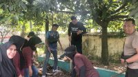 Sinergitas Polri dan Masyarakat Dalam Aksi Bersih Parit Sambut Hari Sampah Nasional 2025