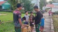 Satgas TMMD Ke-123 Kodim 1015/Sampit Berbagi Takjil di Bulan Suci Ramadhan.
