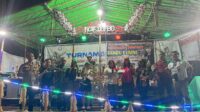 Bhabinkamtibmas Aipda Keristian Hadiri Pembagian Hadiah Turnamen Voli di Naik Dango Saham