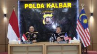 Perkuat Kerjasama Lintas Batas Negara, Polda Kalbar Gelar Rapat Koordinasi Dengan PDRM Kontinjen Serawak