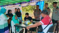 Polres Melawi Berikan Pelayanan Kesehatan Gratis dalam Kegiatan Panen Raya Jagung Serentak Kuartal III
