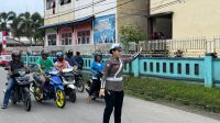 Satgas Preventif Ops Zebra Kapuas Polres Melawi Lakukan Pengaturan Lalu Lintas di Sekolah untuk Pastikan Keselamatan Siswa
