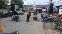 Petugas Polsek Ngabang Laksanakan Pengaturan Lalu Lintas Pagi di Persimpangan dan Depan Sekolah Dasar