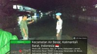 Polsek Air Besar Laksanakan Patroli Malam, Pantau Banjir dan Himbau Warga Tetap Waspada