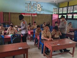 Polsek Kembayan Bagikan 650 Masker kepada Pelajar, Dukung Penanganan Dampak Asap Karhutla